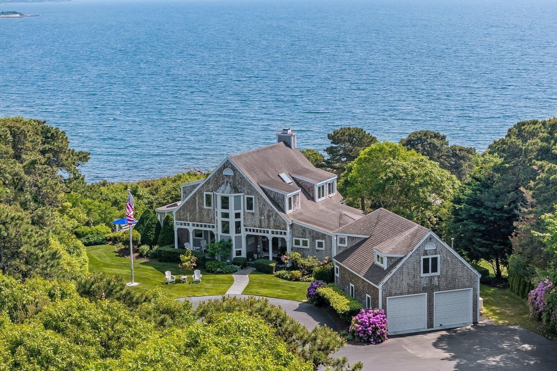 461 Wings Neck Road Pocasset, MA 02559 - Photo 4 of 42 a aerial view of a house with a yard