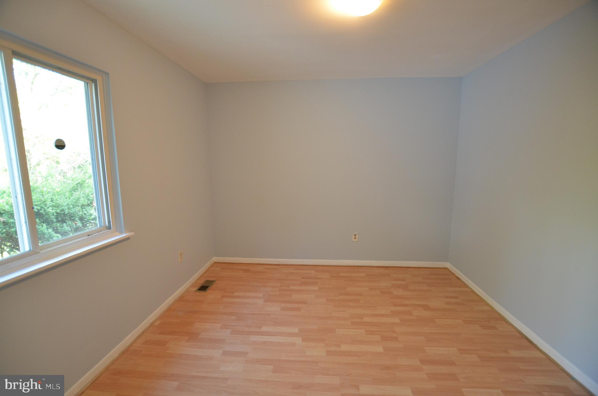 36 Steven Court, Unit 211 Gaithersburg, MD 20877 - Photo 15 of 24 an empty room with a window