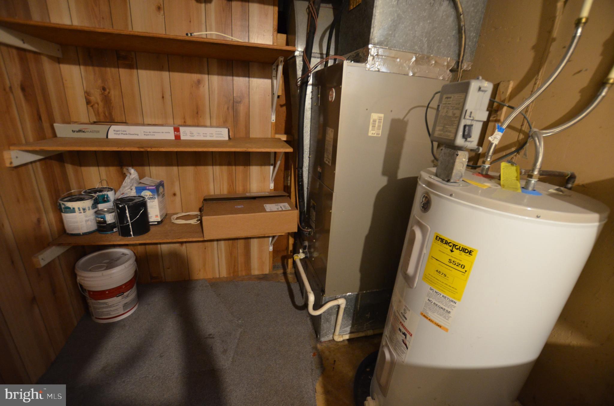 36 Steven Court, Unit 211 Gaithersburg, MD 20877 - Photo 24 of 24 a view of storage and utility room with washer and dryer