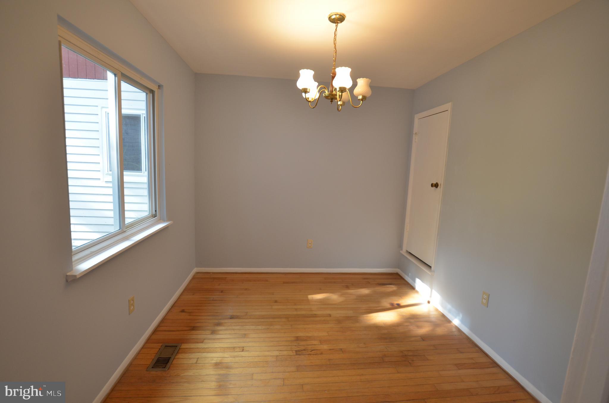 36 Steven Court, Unit 211 Gaithersburg, MD 20877 - Photo 8 of 24 a view of an empty room with a window