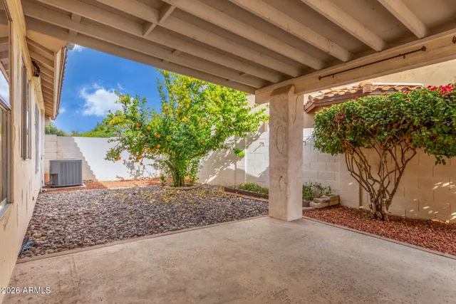 a view of porch with green space