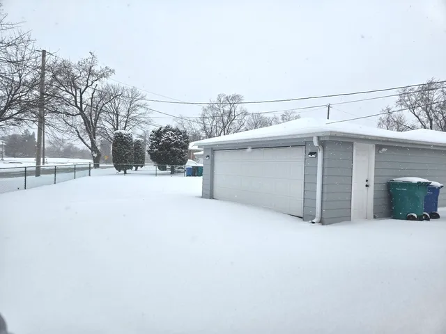 a view of a house with a snow