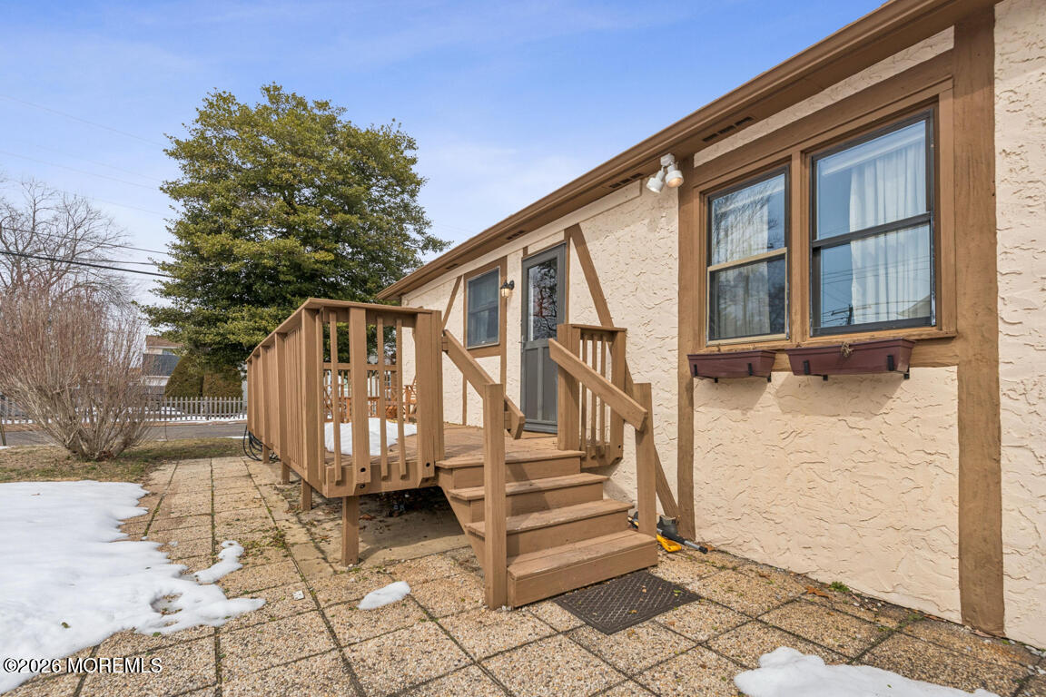 699 Mantoloking Road Brick, NJ 08723 - Photo 13 of 35 a view of wooden house with a yard