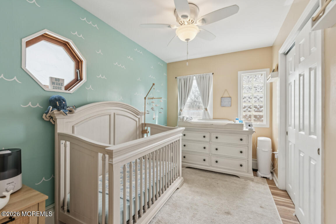 699 Mantoloking Road Brick, NJ 08723 - Photo 25 of 35 a view of a bedroom with furniture and windows