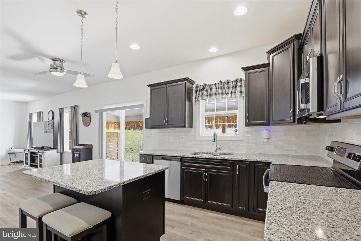 95 Red Maple Drive Etters, PA 17319 - Photo 20 of 42 a kitchen with a stove a sink and a refrigerator