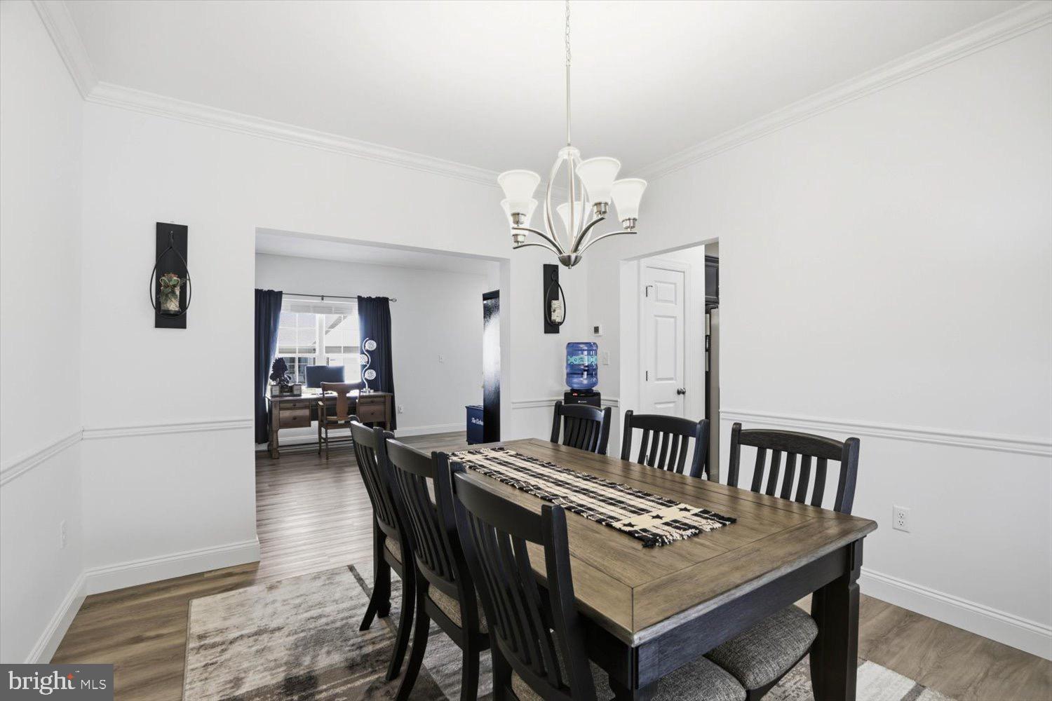 95 Red Maple Drive Etters, PA 17319 - Photo 22 of 42 a view of a dining room with furniture a chandelier and wooden floor
