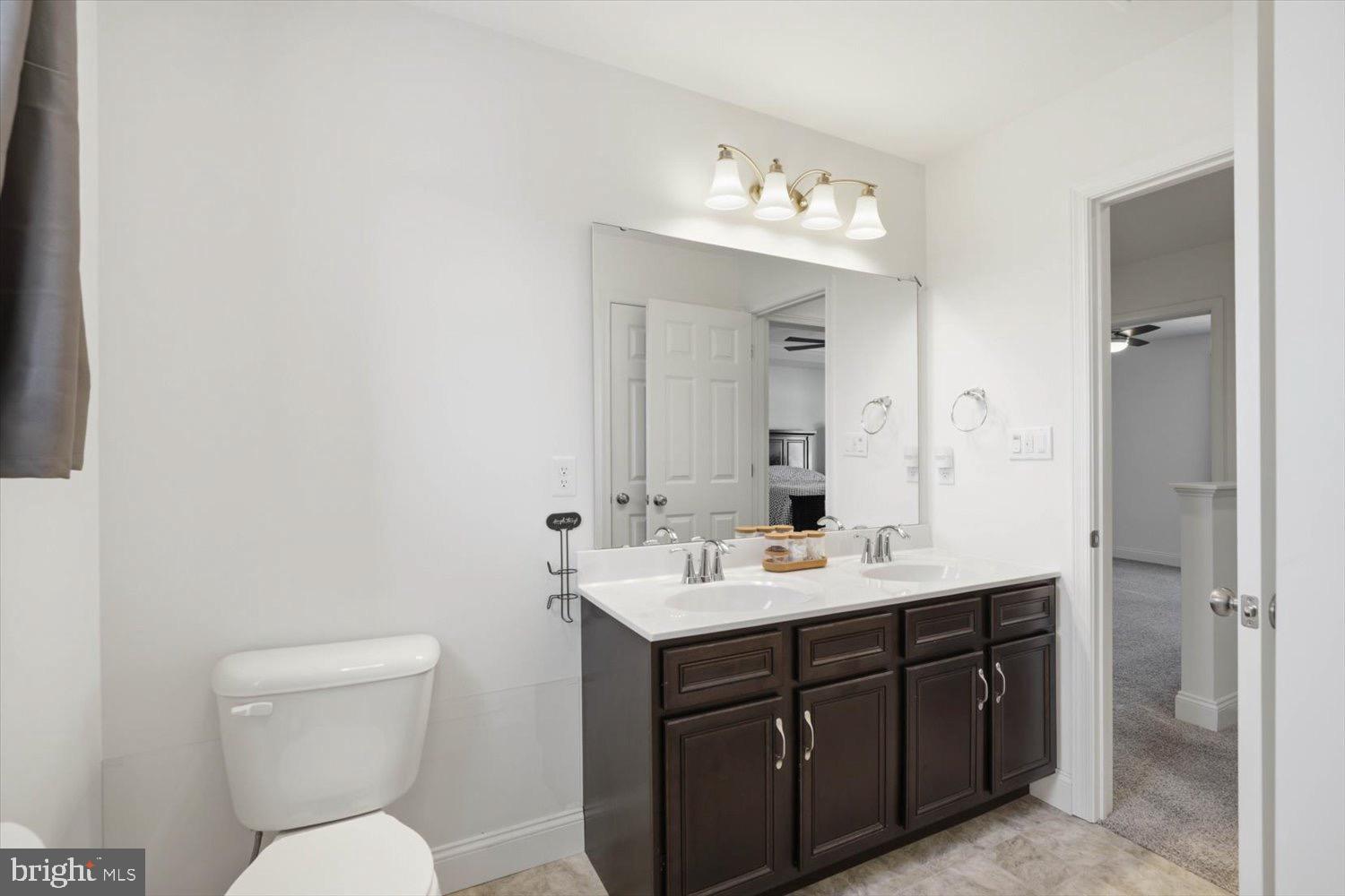 95 Red Maple Drive Etters, PA 17319 - Photo 27 of 42 a bathroom with a toilet sink and mirror