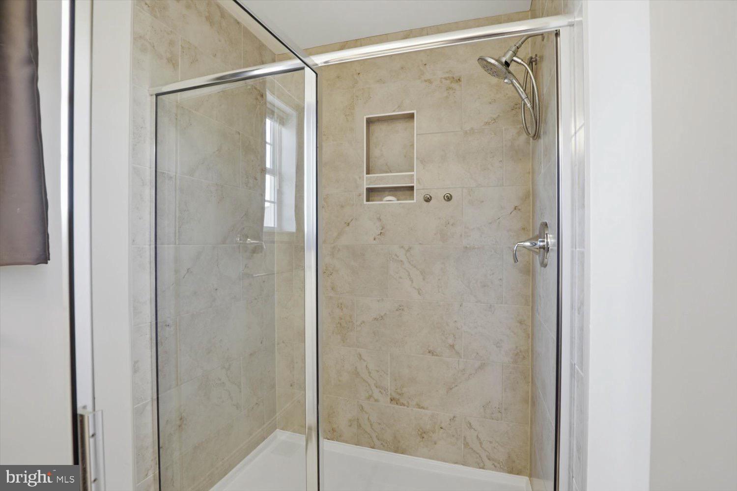 95 Red Maple Drive Etters, PA 17319 - Photo 29 of 42 a bathroom with a glass shower door
