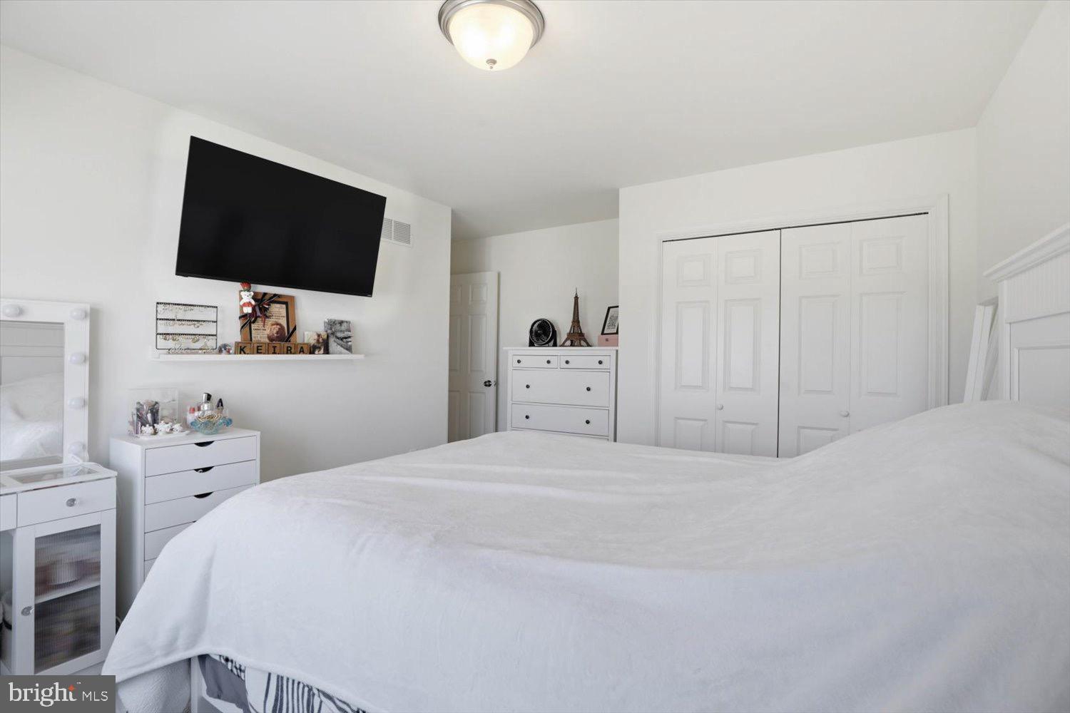 95 Red Maple Drive Etters, PA 17319 - Photo 32 of 42 a bedroom with a bed tv and chair