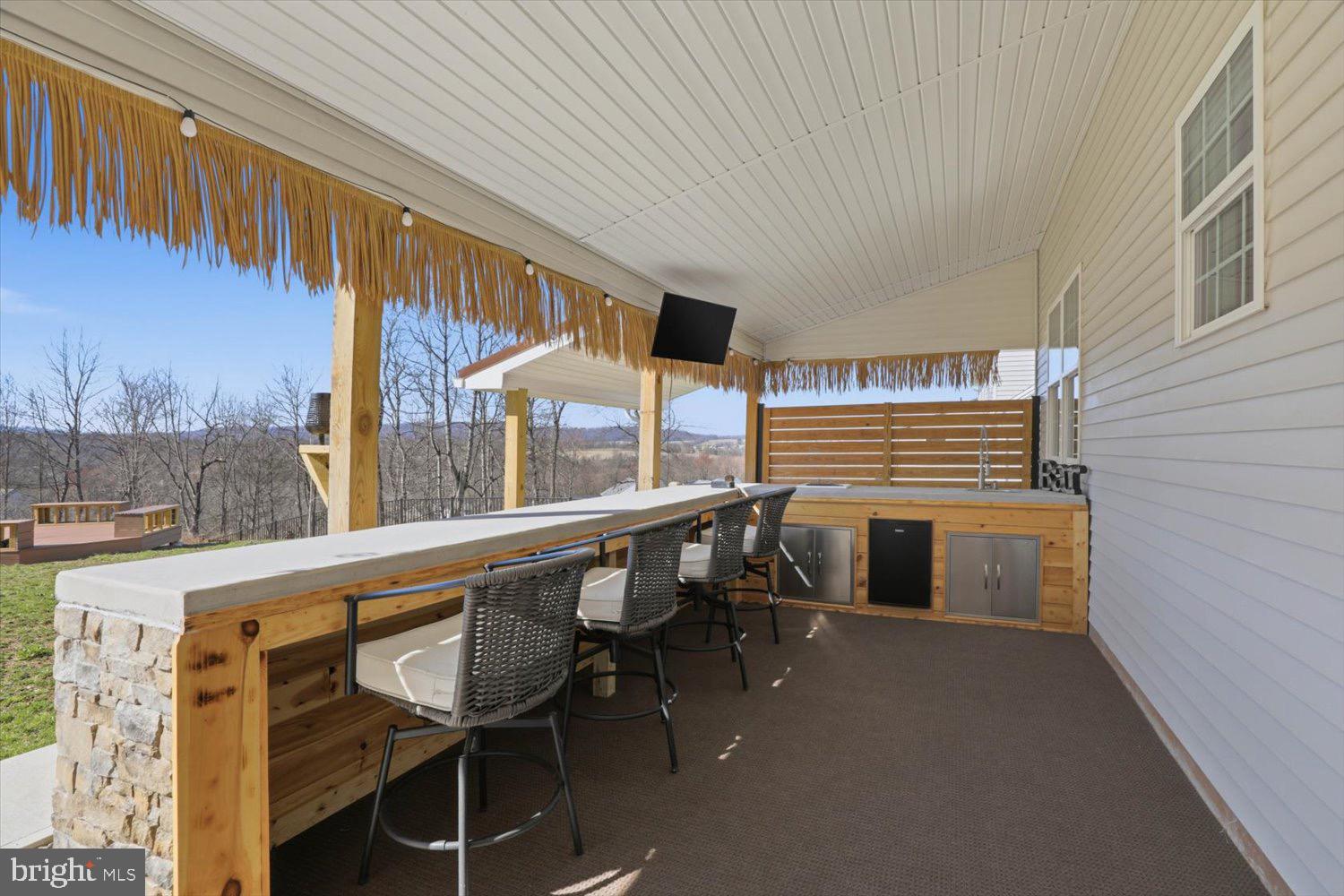 95 Red Maple Drive Etters, PA 17319 - Photo 4 of 42 a balcony with table and chairs