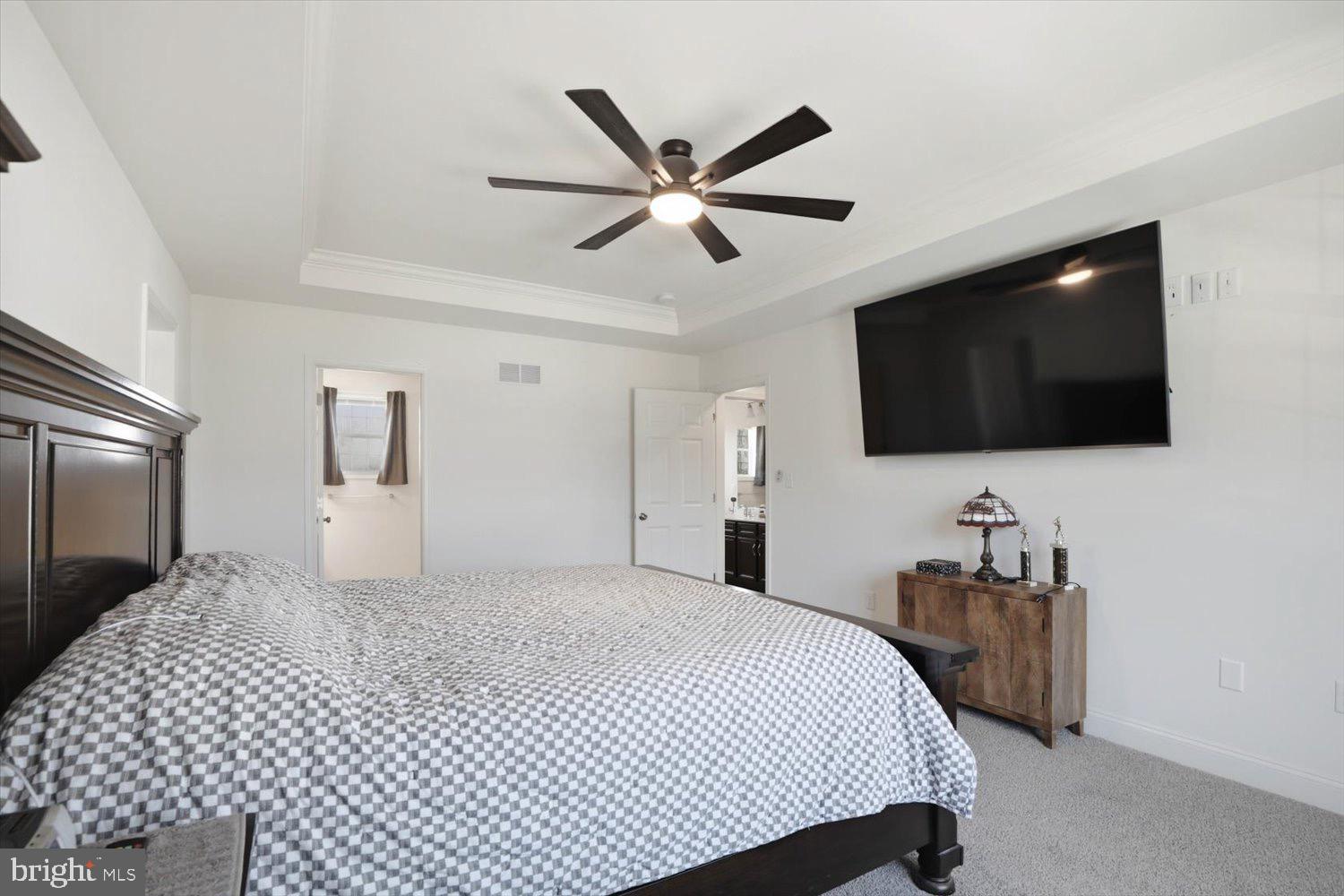95 Red Maple Drive Etters, PA 17319 - Photo 7 of 42 a bedroom with a bed and a flat screen tv