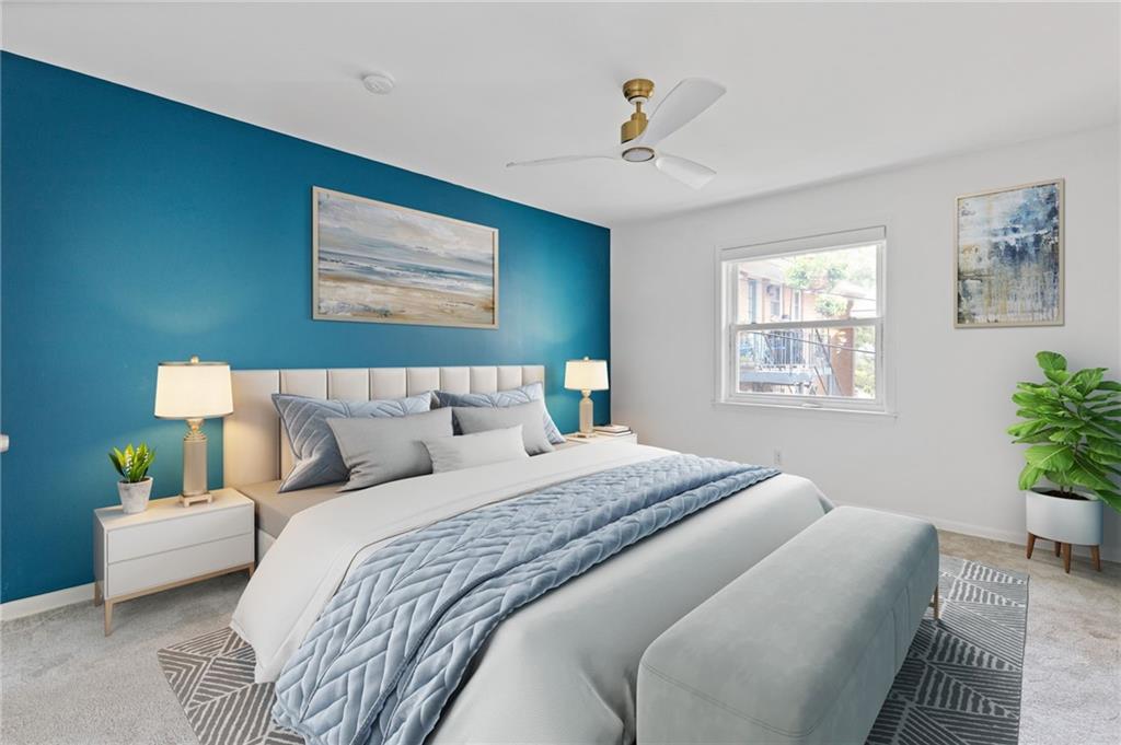 3510 Roswell Road, Unit C2 Atlanta, GA 30305 - Photo 13 of 24 a bedroom with bed and a window