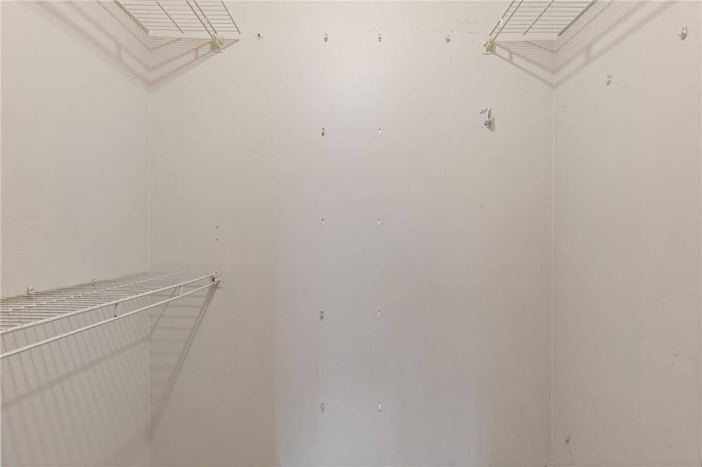 3510 Roswell Road, Unit C2 Atlanta, GA 30305 - Photo 15 of 24 a view of a room with racks on the wall