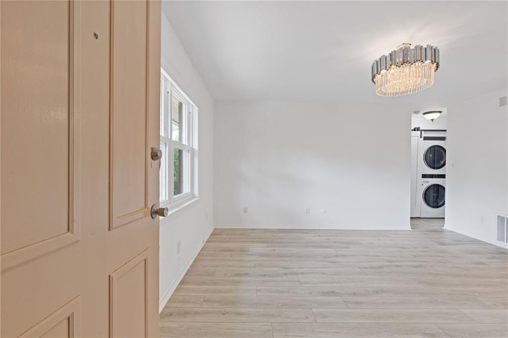 3510 Roswell Road, Unit C2 Atlanta, GA 30305 - Photo 3 of 24 a view of a hallway with wooden floor