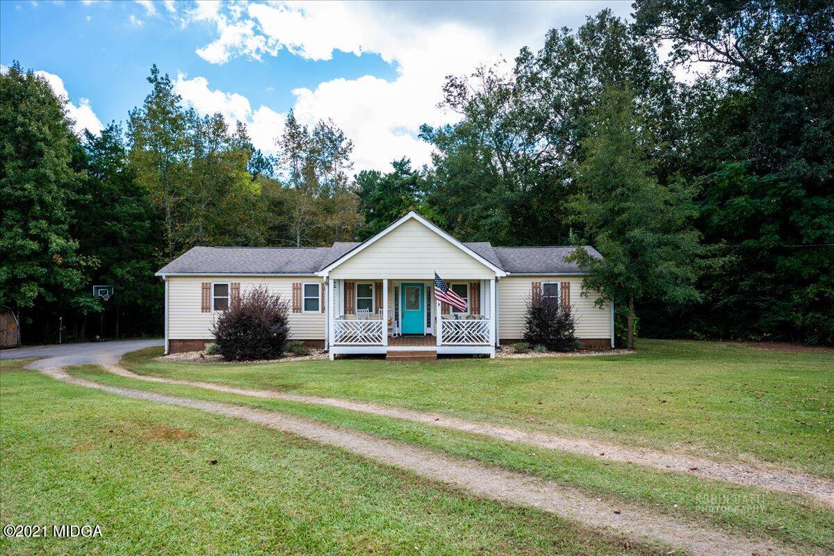 1939 Dames Ferry Road Forsyth, GA 31029 - Photo 1 of 29 a view of a house with a yard