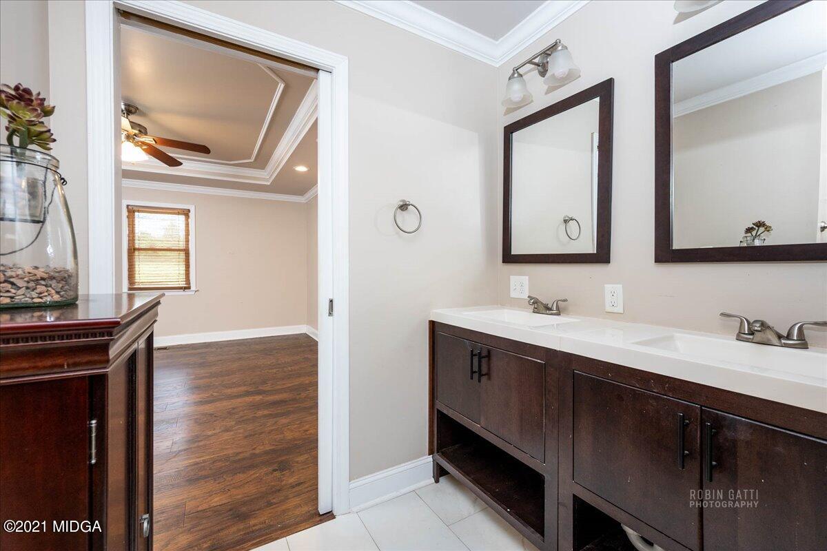 1939 Dames Ferry Road Forsyth, GA 31029 - Photo 12 of 29 a bathroom with a sink and a mirror