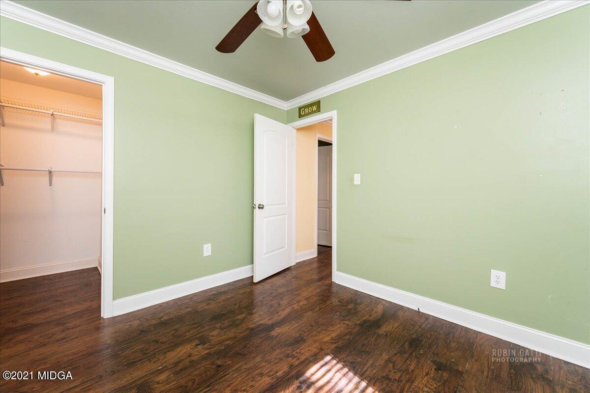 1939 Dames Ferry Road Forsyth, GA 31029 - Photo 16 of 29 a view of room with wooden floor