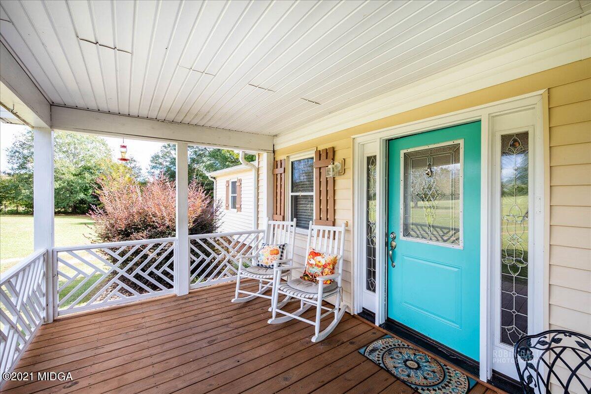 1939 Dames Ferry Road Forsyth, GA 31029 - Photo 18 of 29 a view of a patio with wooden floor