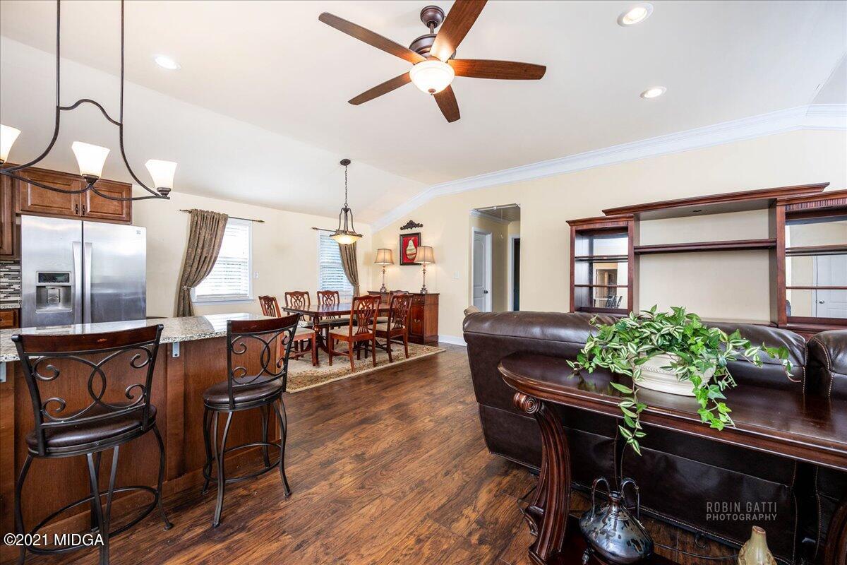 1939 Dames Ferry Road Forsyth, GA 31029 - Photo 5 of 29 a living room with furniture and potted plants