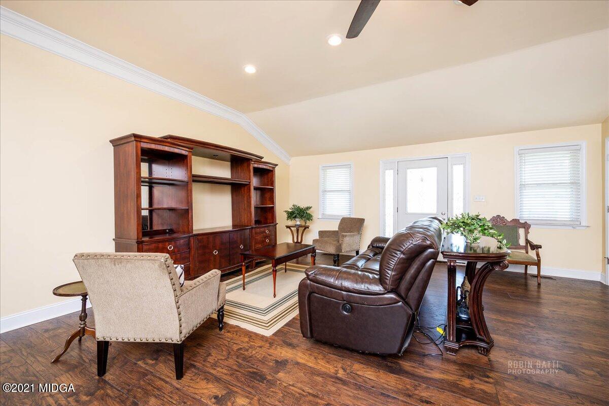 1939 Dames Ferry Road Forsyth, GA 31029 - Photo 7 of 29 a living room with furniture and a flat screen tv