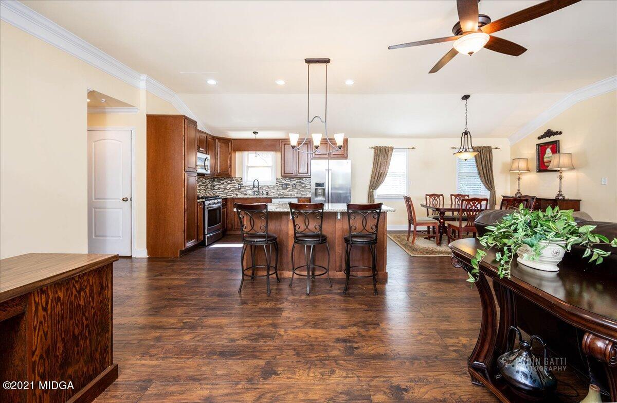 1939 Dames Ferry Road Forsyth, GA 31029 - Photo 8 of 29 a view of a dining room with furniture