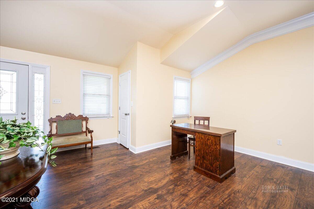 1939 Dames Ferry Road Forsyth, GA 31029 - Photo 9 of 29 a living room with furniture and wooden floor