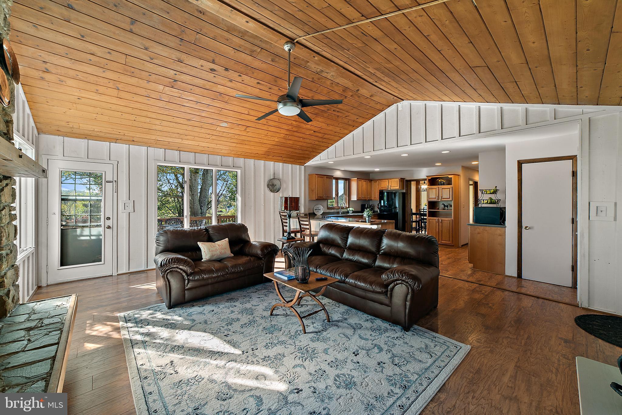 8286 Stable Gate Road Warrenton, VA 20186 - Photo 14 of 52 family room with vaulted ceiling