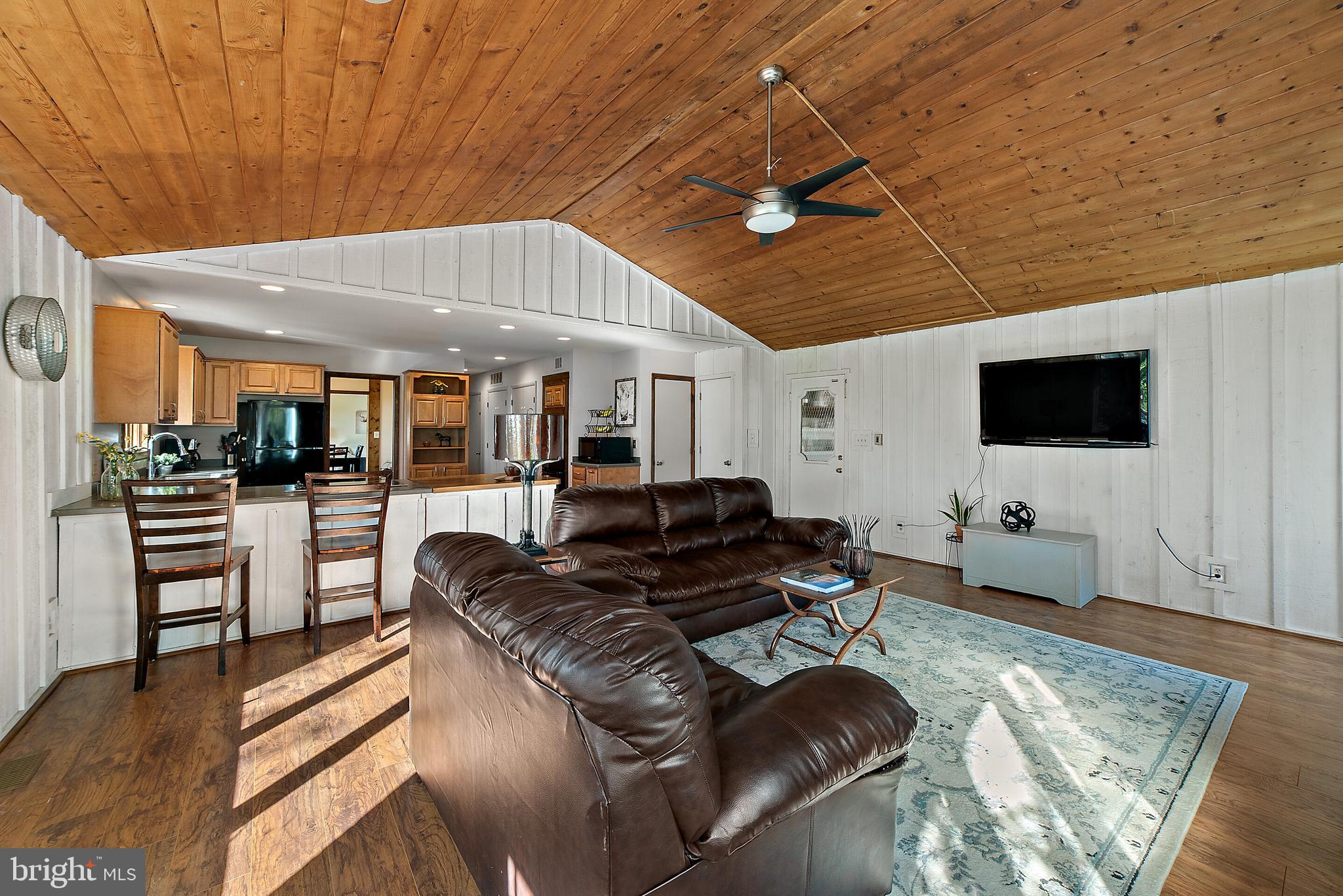 8286 Stable Gate Road Warrenton, VA 20186 - Photo 21 of 52 family room to kitchen