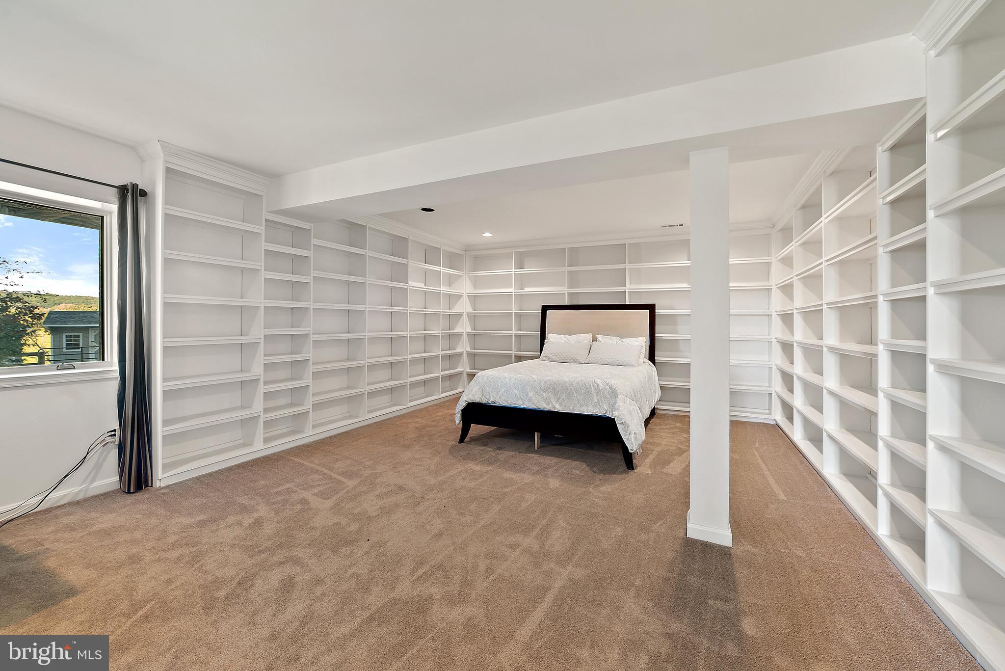 8286 Stable Gate Road Warrenton, VA 20186 - Photo 38 of 52 bedroom with built in shelves/office