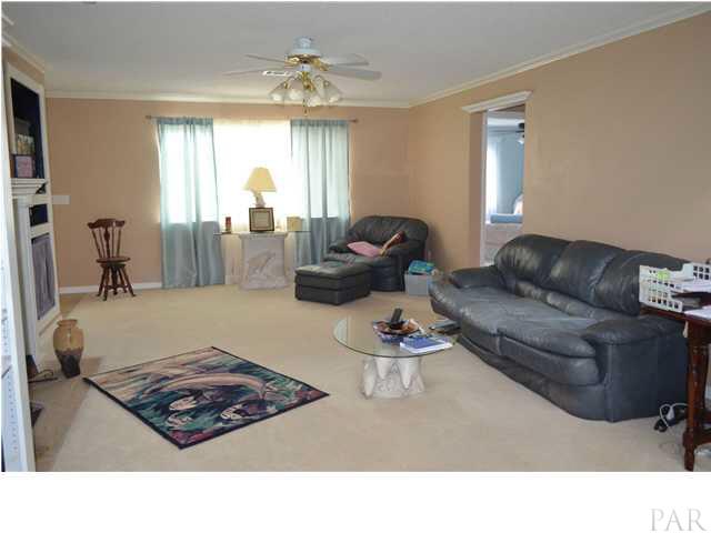 6615 Frank Reeder Road Pensacola, FL 32526 - Photo 4 of 13 Great room - notice crown molding