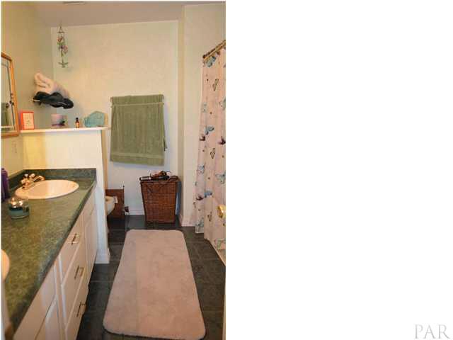 6615 Frank Reeder Road Pensacola, FL 32526 - Photo 8 of 13 Master Bath with dual lavatories and shower only