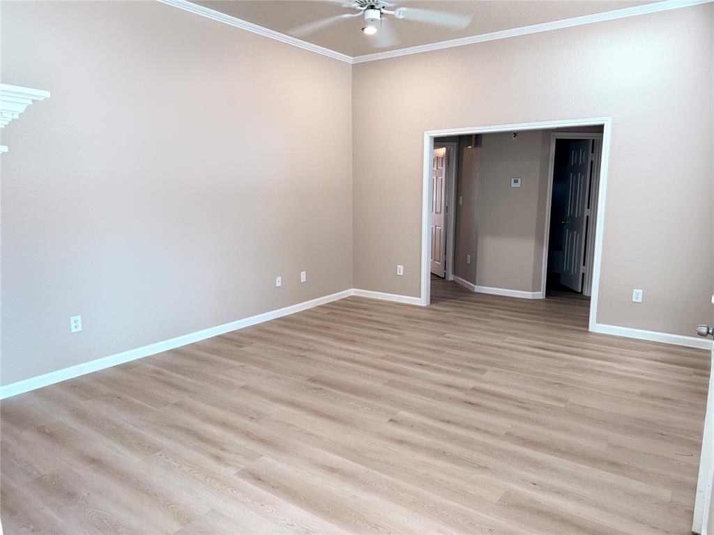 453 Strata Drive Denton, TX 76201 - Photo 5 of 15 a view of room with wooden floor