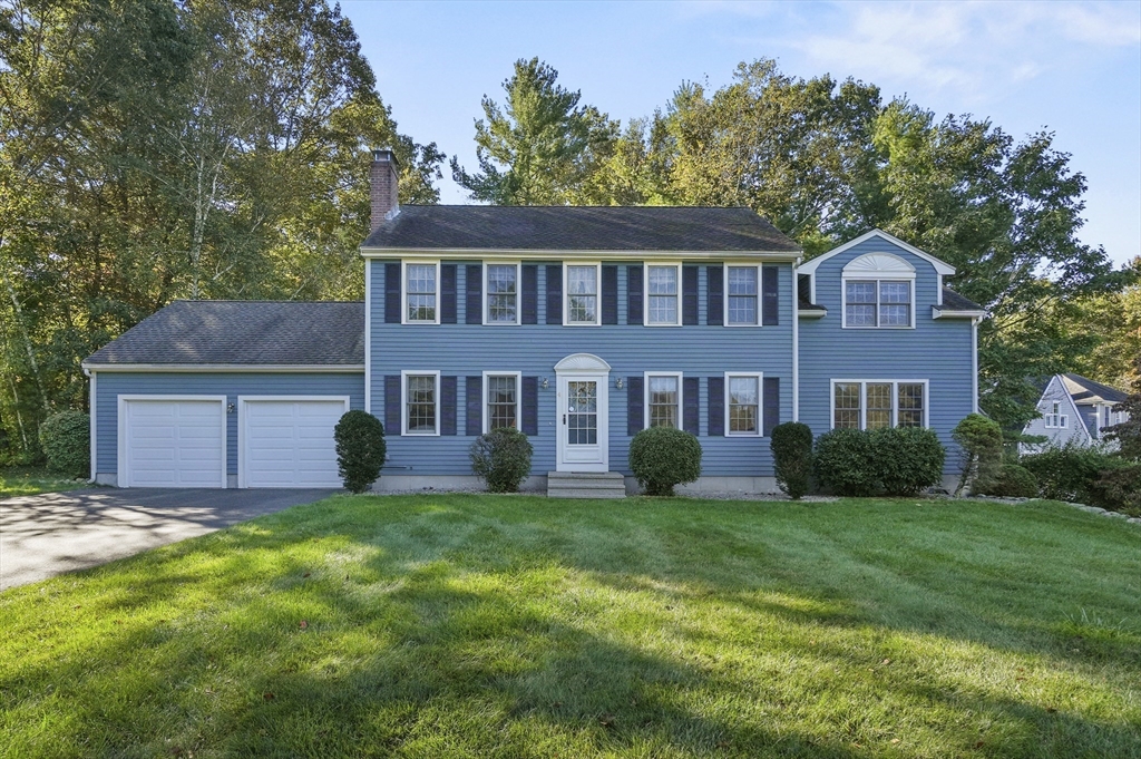 4 Jonathans Way Upton, MA 01568 - Photo 1 of 35 a brick house with a big yard and large trees