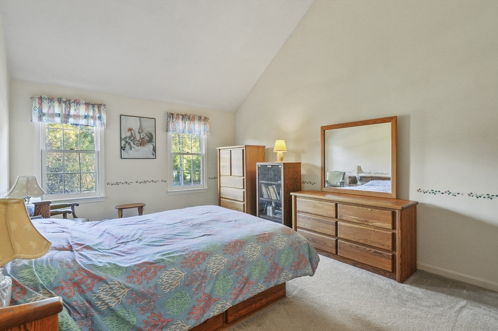 4 Jonathans Way Upton, MA 01568 - Photo 14 of 35 a bed room with a bed and a dresser