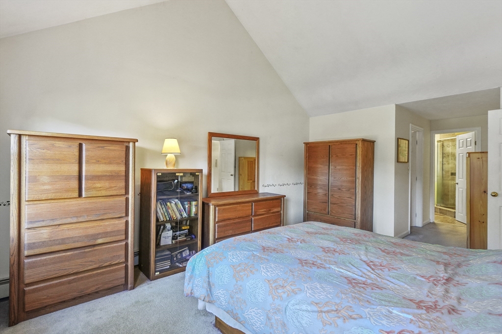 4 Jonathans Way Upton, MA 01568 - Photo 16 of 35 a bedroom with a bed and a dresser