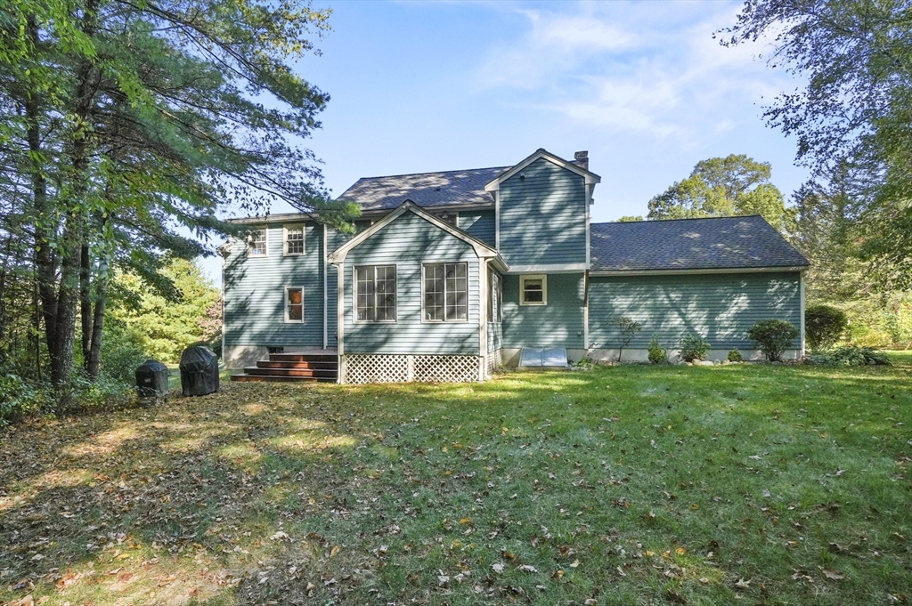 4 Jonathans Way Upton, MA 01568 - Photo 29 of 35 a view of a house with a big yard and large tree