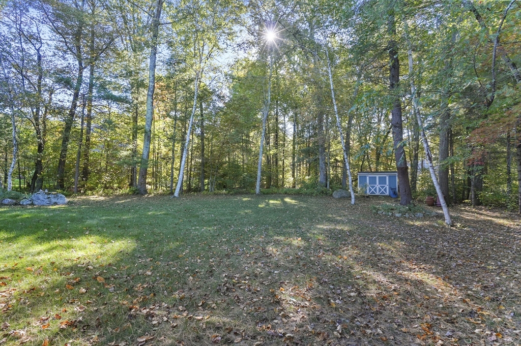 4 Jonathans Way Upton, MA 01568 - Photo 32 of 35 a view of a backyard with trees