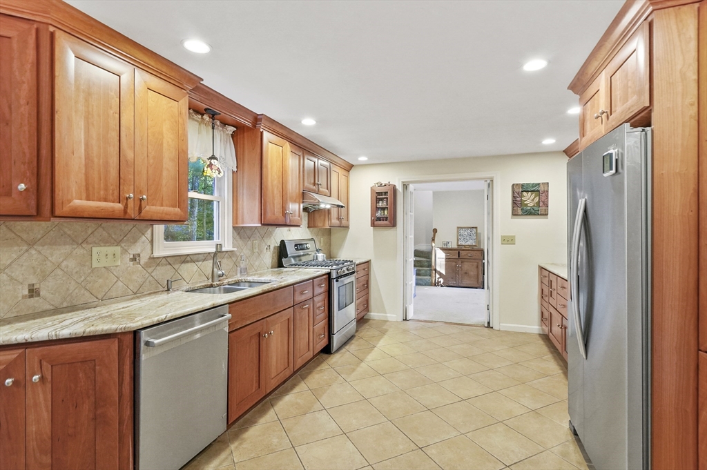 4 Jonathans Way Upton, MA 01568 - Photo 9 of 35 a large kitchen with a large window