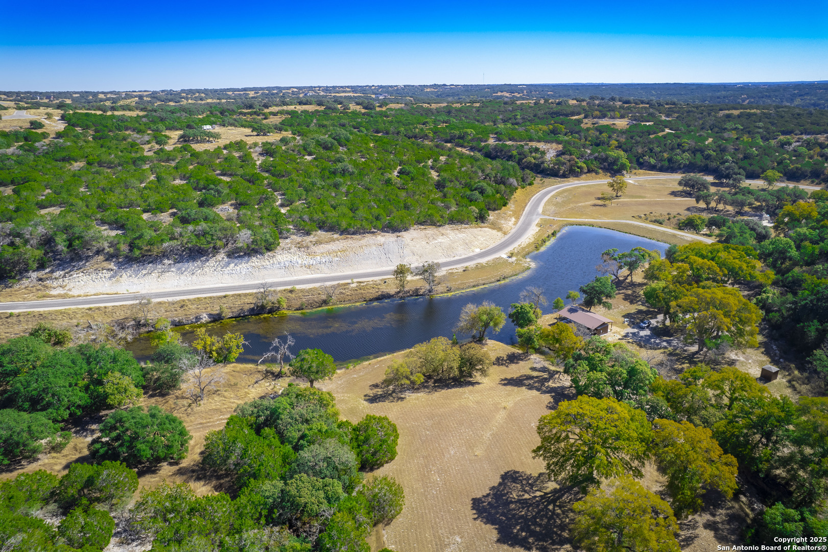 Lot 67 Loma Vista Ranch Kerrville, TX 78028 - Photo 8 of 11 an aerial view of a house with a garden