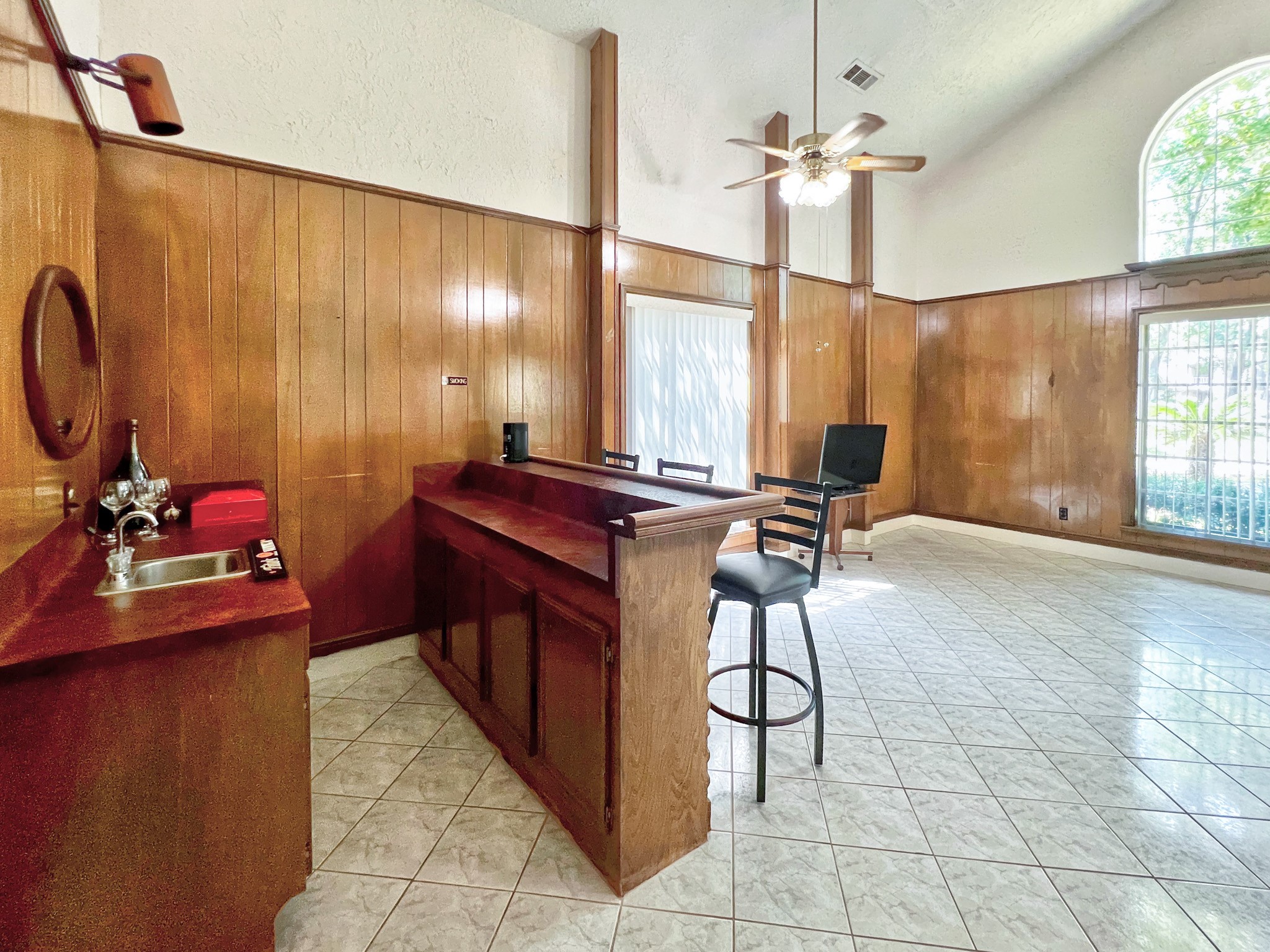 16902 Summit Oaks Lane Spring, TX 77379 - Photo 16 of 49 a view of a workspace with furniture and a window