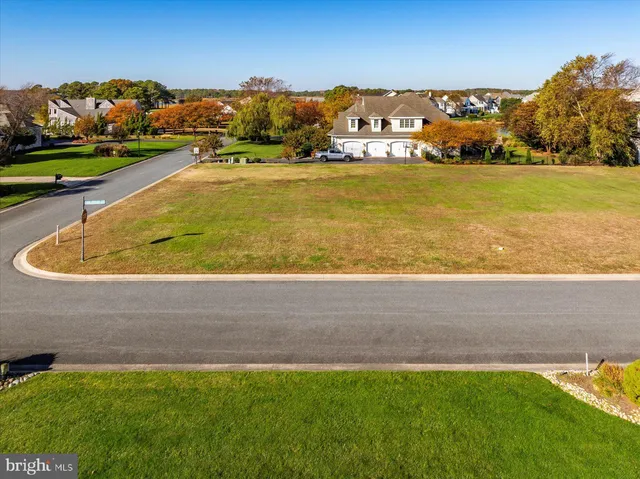 a view of a swimming pool with an ocean view