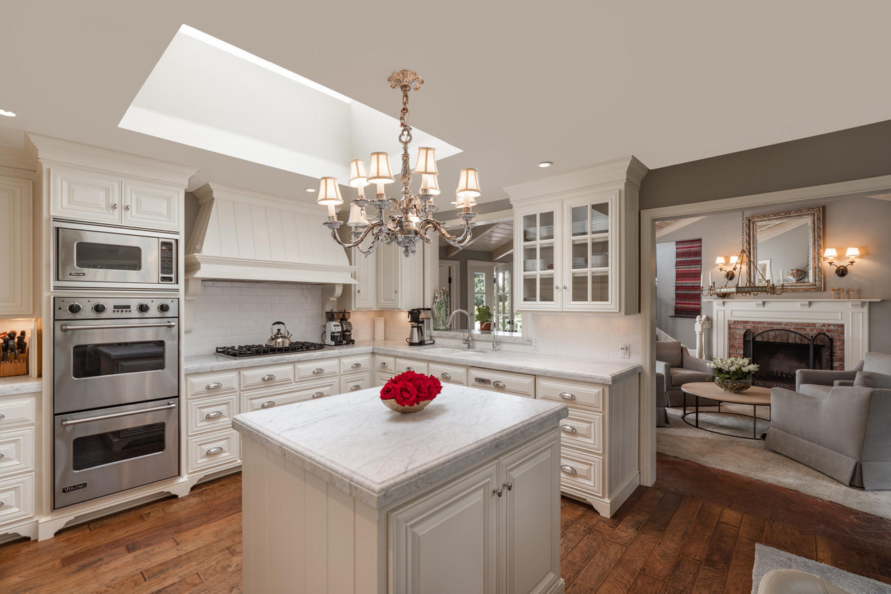 1077 Summit Road Santa Barbara, CA 93108 - Photo 14 of 49 a kitchen with a sink dishwasher a stove and a refrigerator with wooden floor
