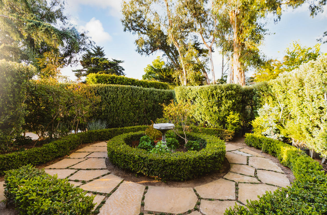1077 Summit Road Santa Barbara, CA 93108 - Photo 48 of 49 a view of a garden with a fountain