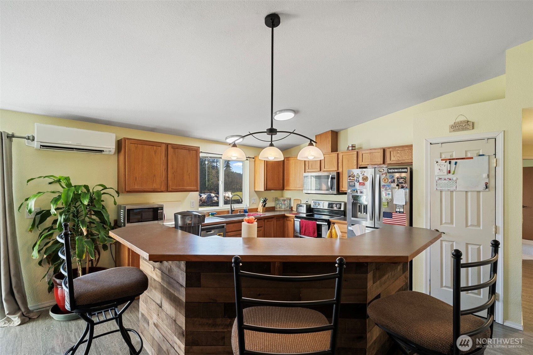 146 Rocky Lane Chehalis, WA 98532 - Photo 12 of 40 a dining room with furniture a chandelier and window
