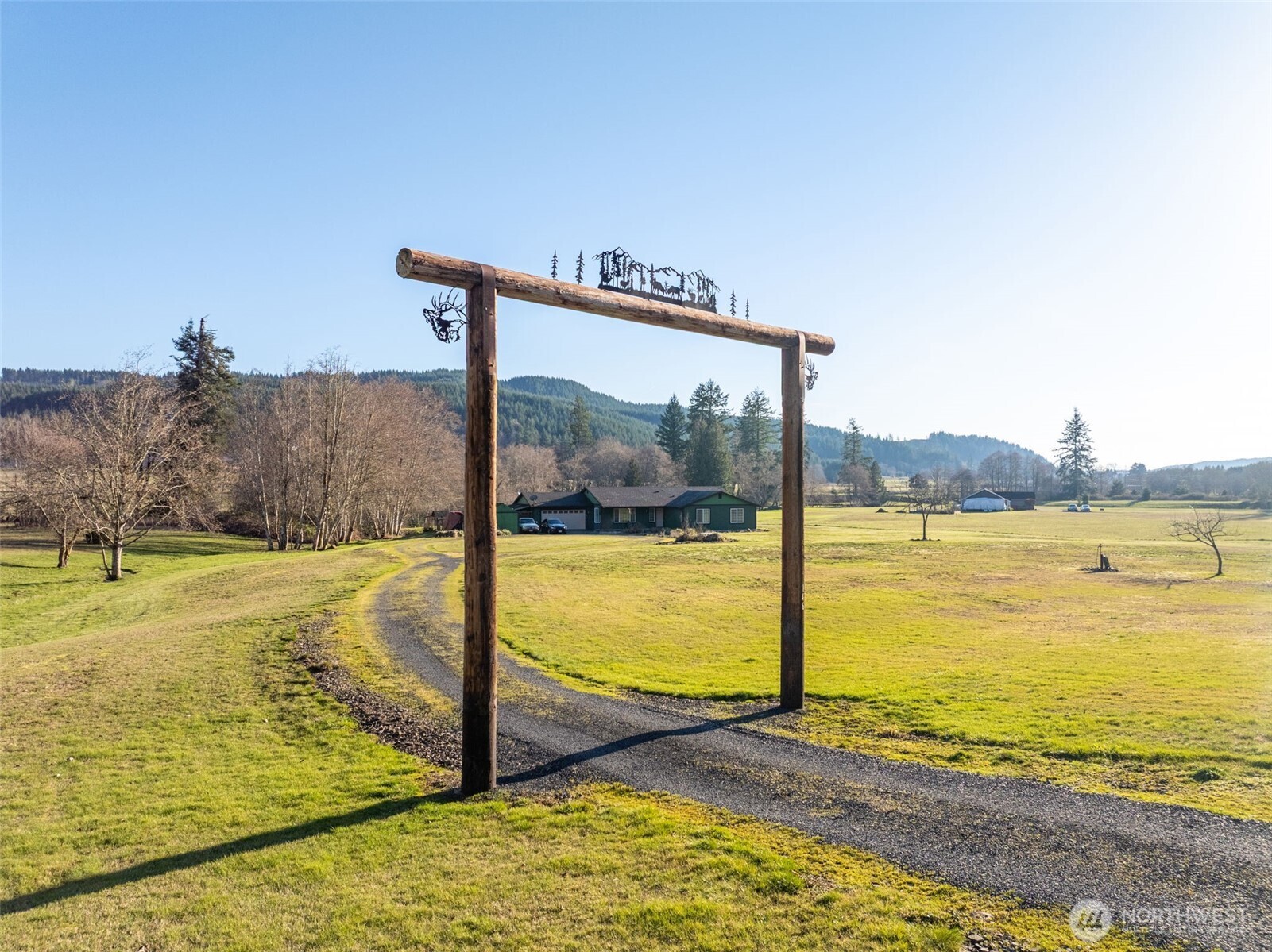 146 Rocky Lane Chehalis, WA 98532 - Photo 2 of 40 a view of a swimming pool with an ocean view