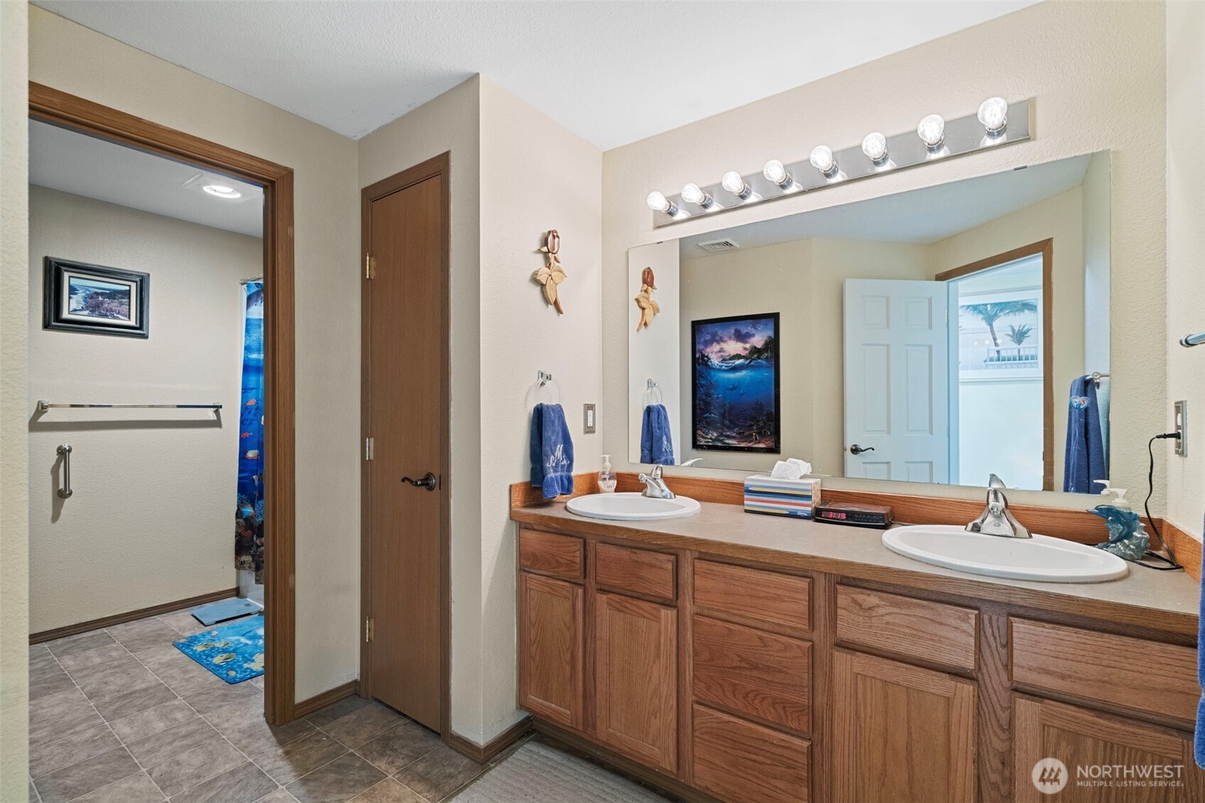 146 Rocky Lane Chehalis, WA 98532 - Photo 22 of 40 a bathroom with a double vanity sink and a mirror