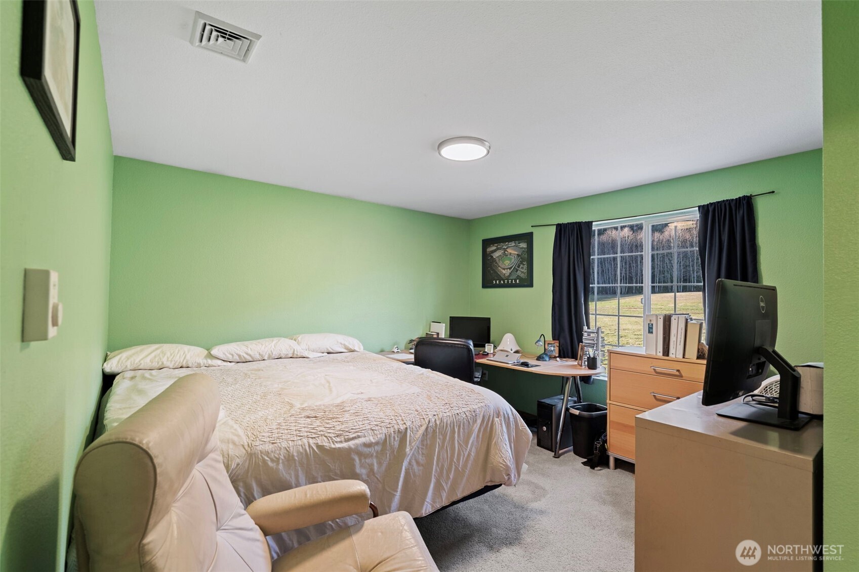 146 Rocky Lane Chehalis, WA 98532 - Photo 27 of 40 a bedroom with a bed and large windows