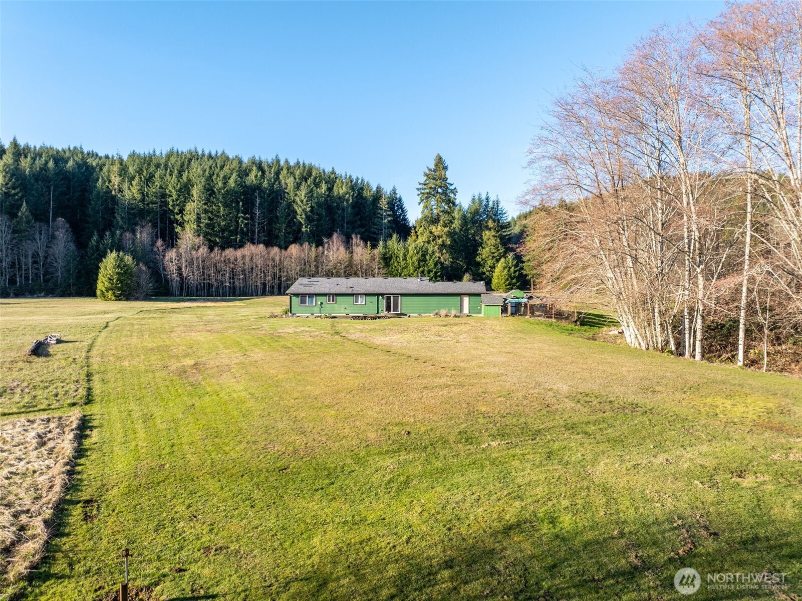 146 Rocky Lane Chehalis, WA 98532 - Photo 33 of 40 a swimming pool with an outdoor space and seating area