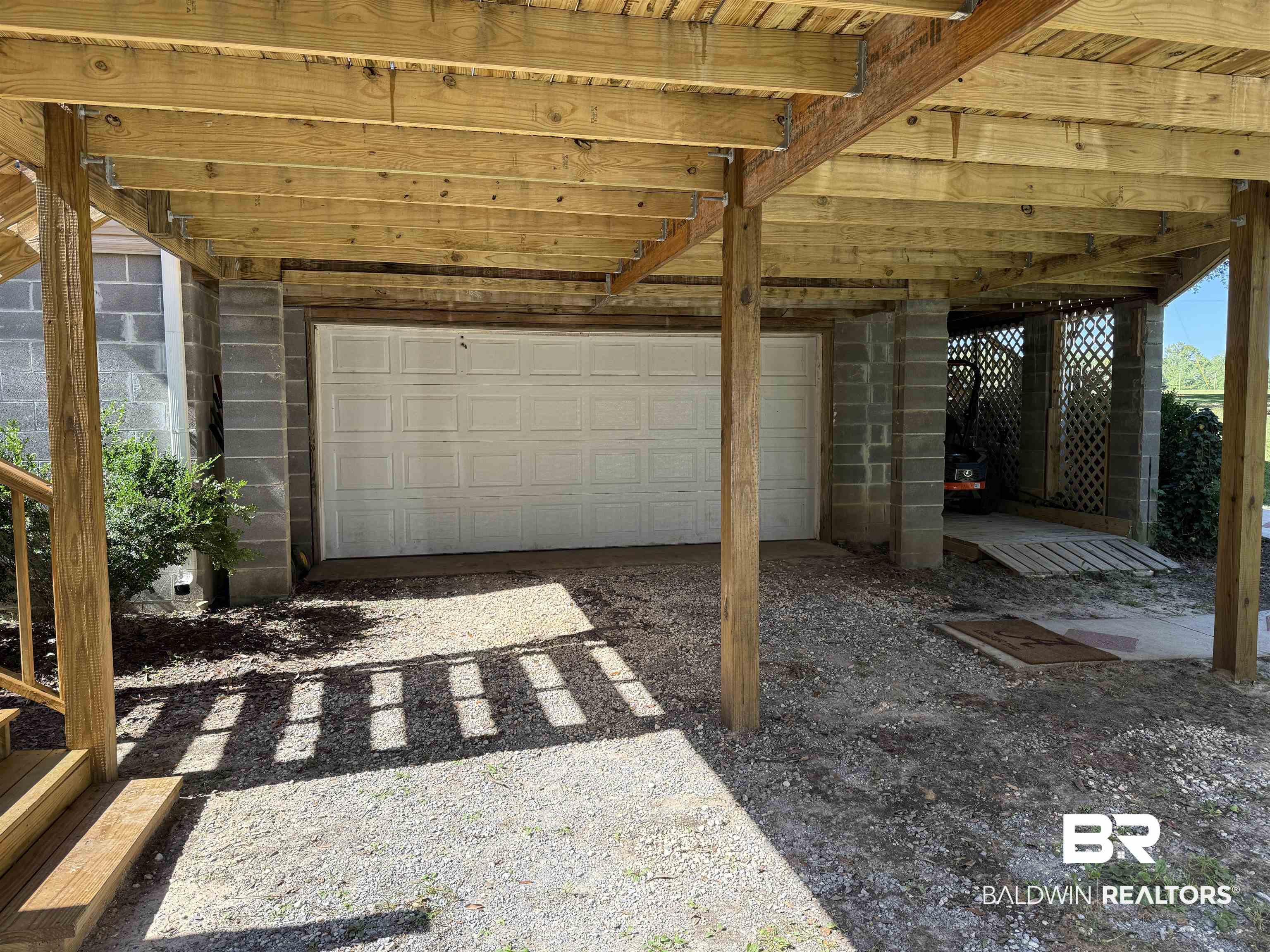 14601 Trawick Road Stapleton, AL 36578 - Photo 30 of 37 Garage featuring driveway