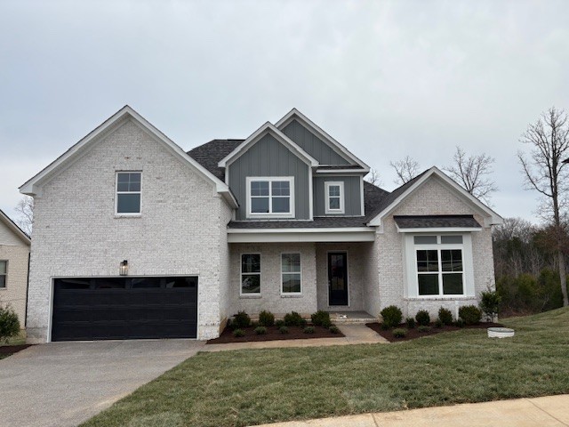 821 Saddle Ridge Drive Old Hickory, TN 37138 - Photo 5 of 29 a front view of a house with a yard